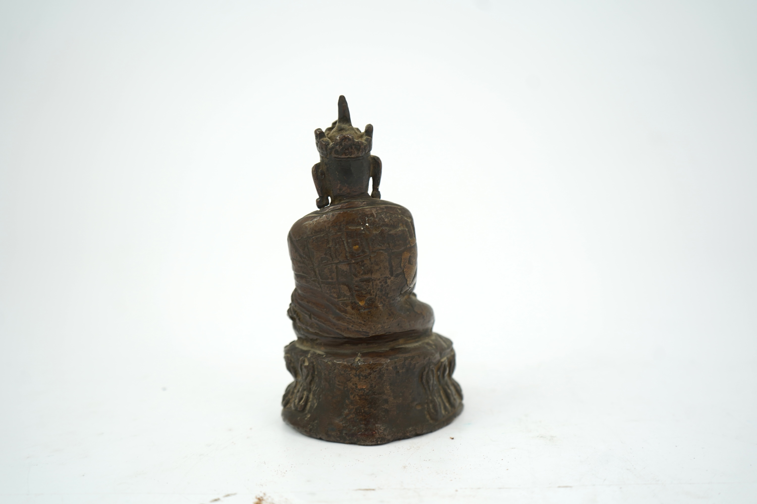 A Nepalese copper alloy figure of Vairocana, 19th century or later